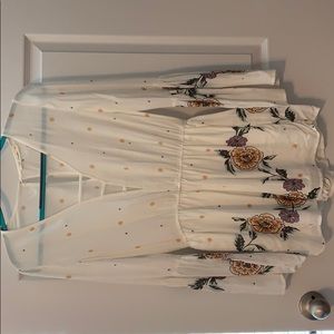 White and floral romper